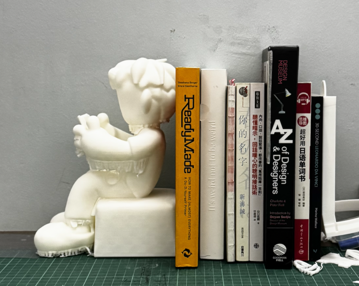 bkem reading bookend with books