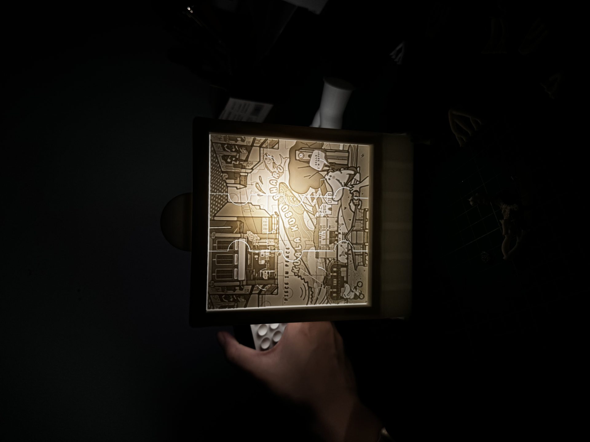 Puzzle lit from behind in the dark